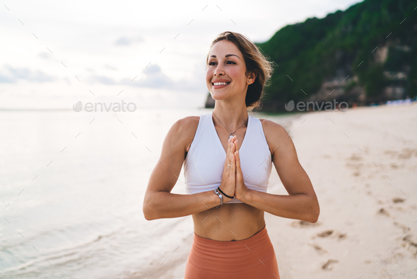 A Beautiful Fit Woman Smiles in Workout Clothes. Stock Image