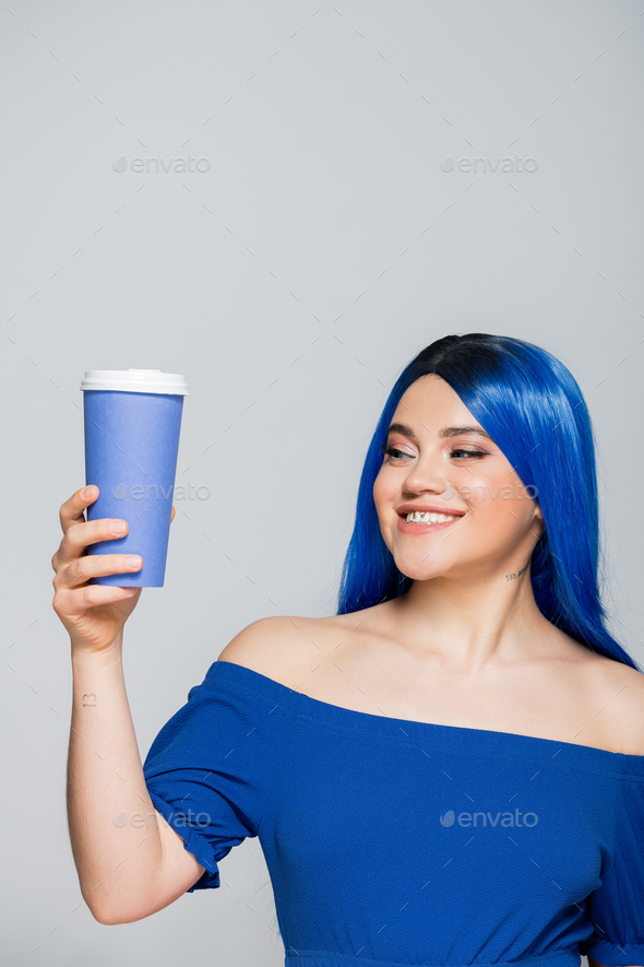 Coffee On The Go. Beautiful Young Woman Holding Coffee Cup And