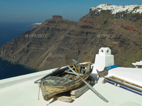 Beautiful details of Santorini island in Greece, by the Mediterranean Sea  Stock Photo by wirestock