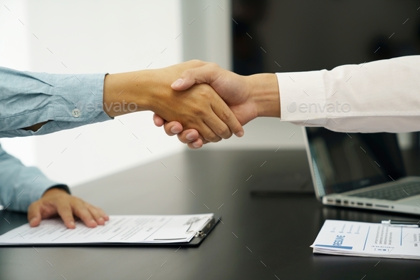Businessman shaking hands successful candidate