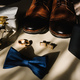 Men's accessories: watches, cufflinks, bow tie, perfume, shoes