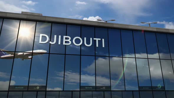 Airplane landing at Djibouti Jibuti airport mirrored in terminal alt