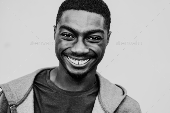 Close up black and white smiling young african man Stock Photo by ...