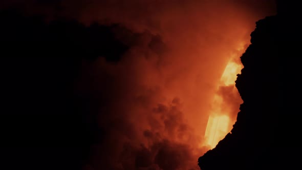 Lava from the Kilauea volcano flows into the ocean alt