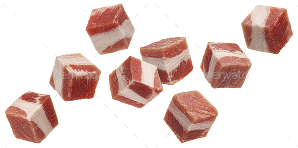 Falling bacon cubes, diced smoked ham isolated on white background