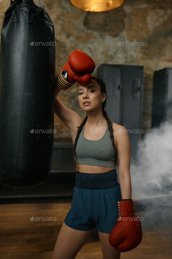 Placeit - Sports Bra Mockup of a Woman Wearing Boxing Gloves