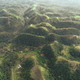 Philippines countryside hills aerial view: greenery landscape, small hillside lake, houses at Mayon - PhotoDune Item for Sale