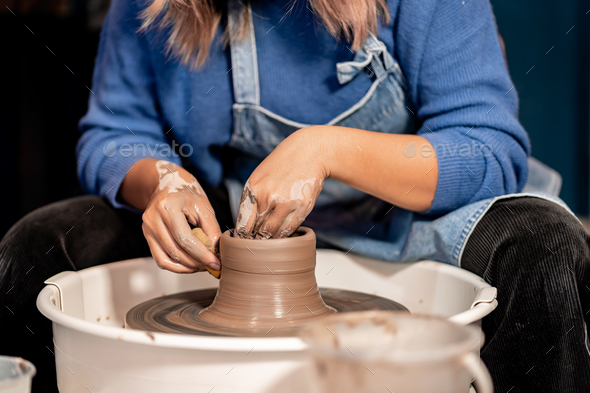 earthenware The art of sculpting clay with ceramics being molded by hand  Stock Photo by sarawut20003