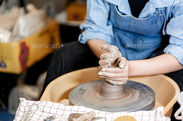 earthenware The art of sculpting clay with ceramics being molded by hand  Stock Photo by sarawut20003