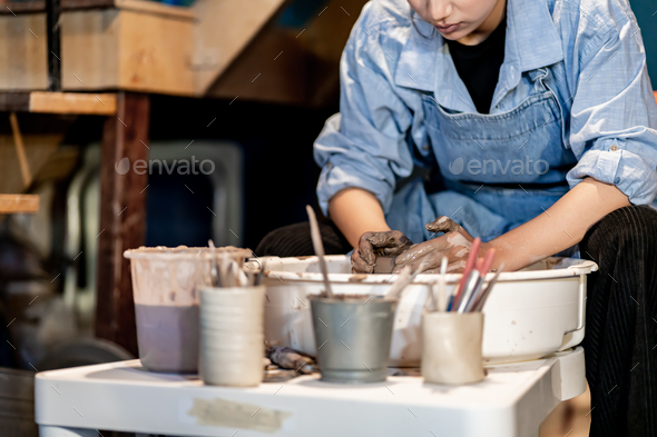 earthenware The art of sculpting clay with ceramics being molded by hand  Stock Photo by sarawut20003