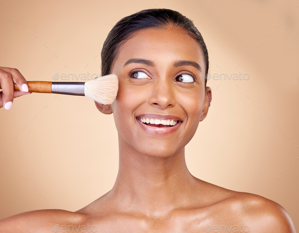 Black woman, makeup brush and beauty in studio for skincare portrait,  wellness and cosmetics by bac Stock Photo by YuriArcursPeopleimages