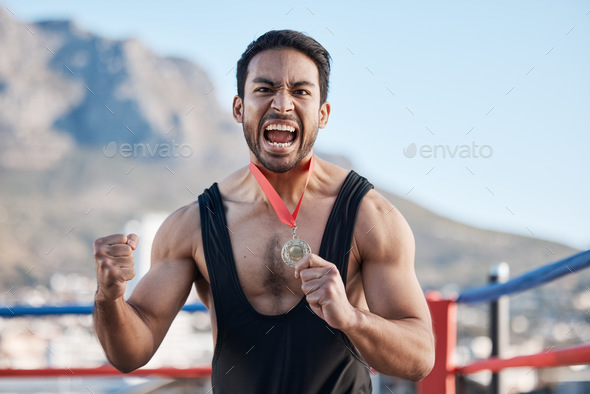 Champion man, wrestling medal and celebration in portrait, success or fist in air for sports contes