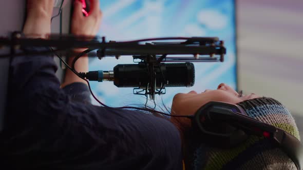 Vertical Video Pro Cyber Woman Talking at Streaming Professional Microphone alt