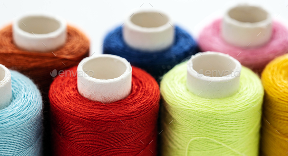 Macro Picture Of Yarn Bobbins Of Different Colors Stock Photo