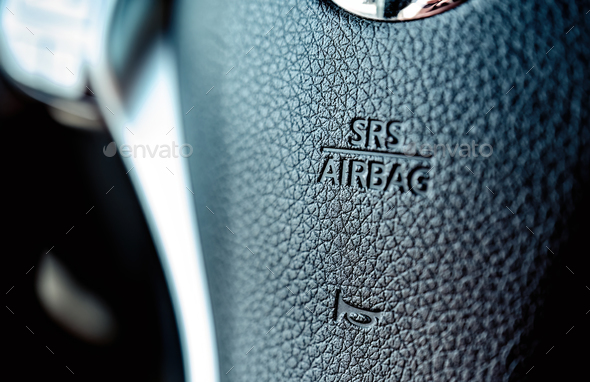 Air Bag sign on a steer wheel in the car