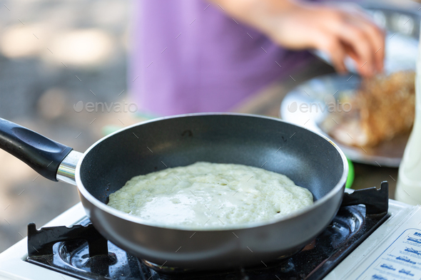 Cooking thin pancakes in camping conditions, camping, portable stove
