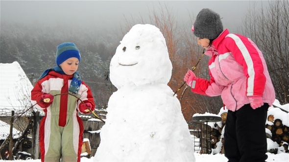 Kids And Snowman