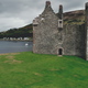 Hyperlapse Scottish castle ruins aerial shot on Loch Ranza bay. Historical monument and heritage - PhotoDune Item for Sale