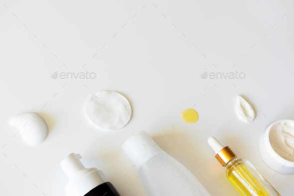 Beauty products for facial skin care on white background, above