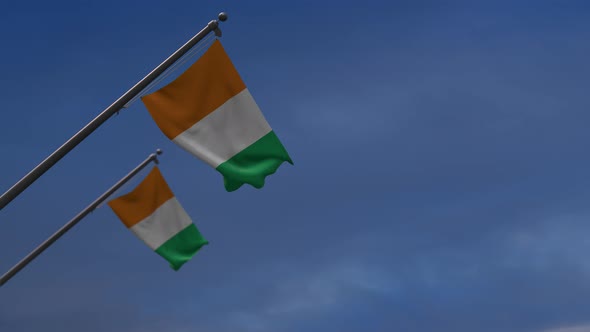 Ivory Coast Flags In The Blue Sky - 4K