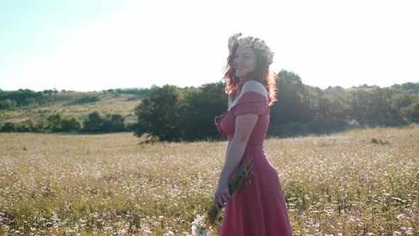 Beautiful Young Woman in Chamomile Field alt