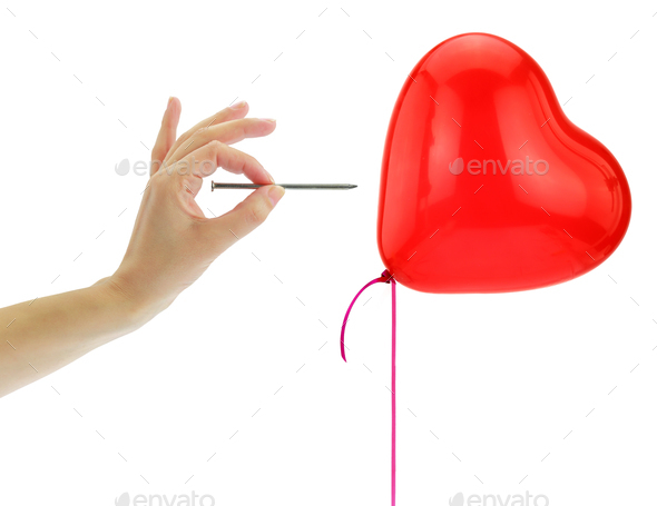 Couple Βreaking up, separation concept. Red heart shape balloon pop isolated on white