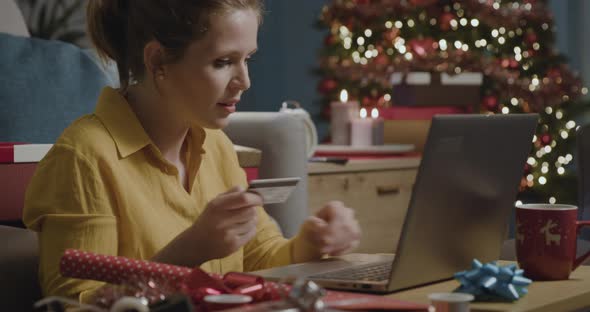 Woman doing online shopping at Christmas