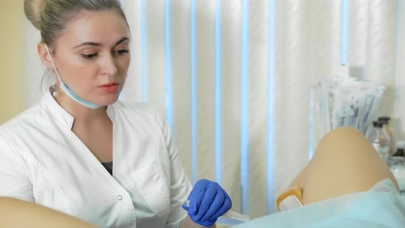 Patient and Doctor in the Gynecologist`s Office alt