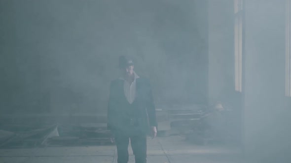 Portrait Confident Brutal Gangster in Fedora Hat and Classical Suit Walk From Smoke alt