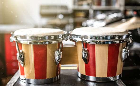 Colorful bongos drums in recording studio
