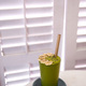 Green vegan healthy smoothie with mint in glass in female hands. - PhotoDune Item for Sale