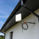Antenna amplifier for mobile internet at home, mounted on the facade of the house outside. - PhotoDune Item for Sale