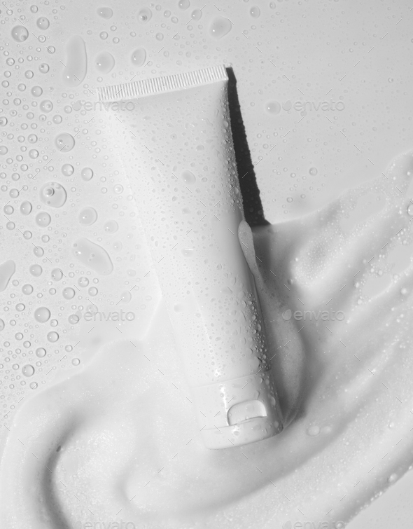 White plastic tube mockup with moisturizer cream, shampoo or facial cleanser, gentle soap foam