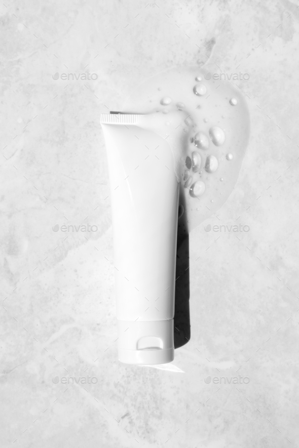 White plastic tube mockup with moisturizer cream, shampoo or facial cleanser and gentle soap foam