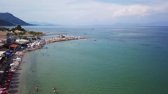 Greece, Corfu Island, drone footage of Messonghi Beach, Moraitika.  Forward Flight and Rise. alt
