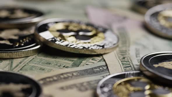 Rotating shot of Bitcoins (digital cryptocurrency) - Ripple alt