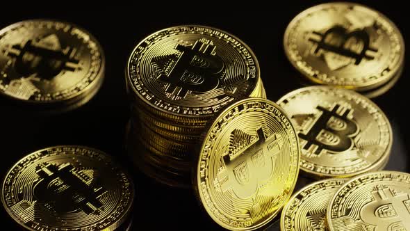 Rotating shot of Bitcoins (digital cryptocurrency) - BITCOIN alt