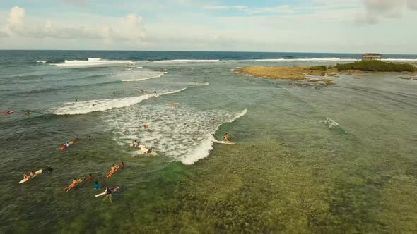 Surfers on the Water Surface alt