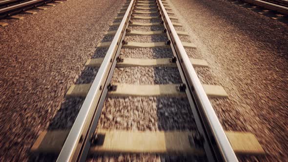 Endless animation of the locomotive front view moving on the railroad track. HD alt