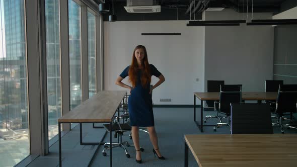 A Business Woman in Glass Modern Office Skyscraper, Exulted By Happiness alt