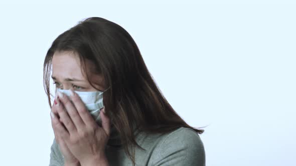Young Infected Girl on White Background Coughs Heavily. Covid-19 Virus Spread alt