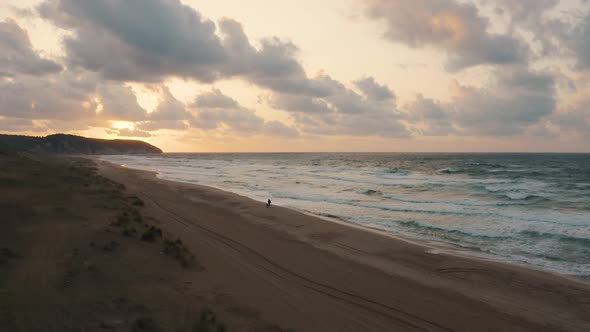 A Lonely Man Walks On The Beach 7