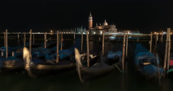 Timelapse of Laguna Veneta with gondolas at night