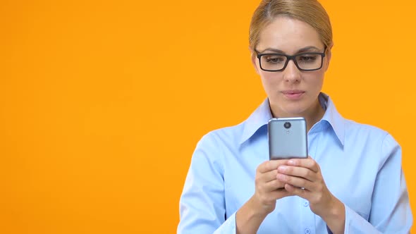 Excited Female Manger Chatting on Smartphone, Business E-Mail, Promotion alt