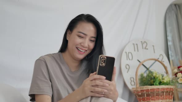 Happy woman making video call with couple.