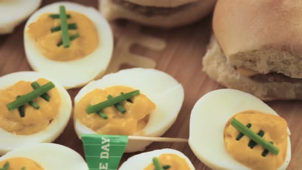 Football deviled eggs for Super Bowl party. alt