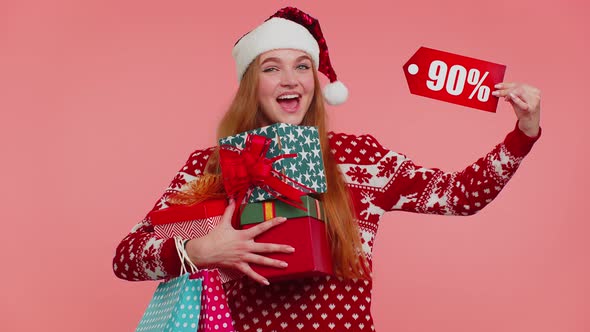 Woman in Christmas Sweater Showing Gift Box and 90 Percent Discount Inscriptions Banner Text Note alt