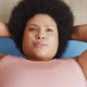 Video of plus size african american woman exercising at home - VideoHive Item for Sale