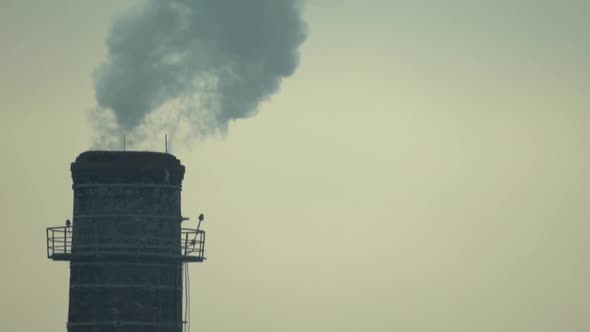 Smoke Comes From the Chimney. Air Pollution. Slow Motion. Ecology. Kyiv. Ukraine alt