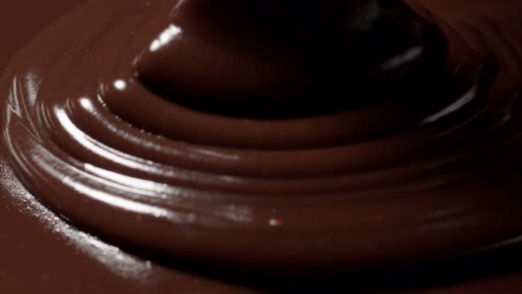 Pouring Premium Dark Melted Hot Chocolate Process of Making Confectionery Sweet Desserts Icing alt